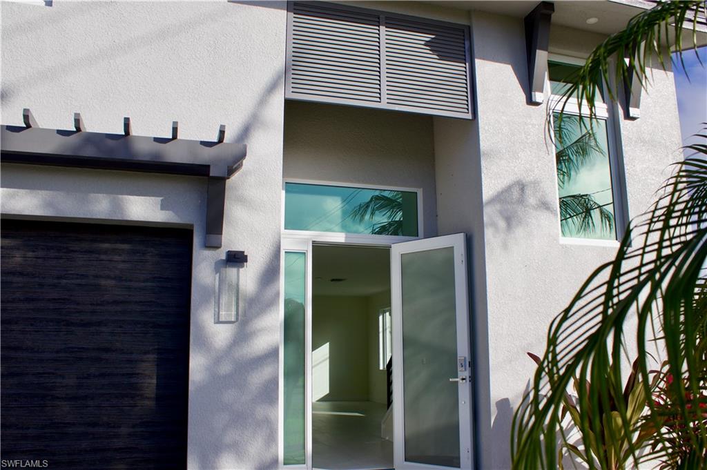 799 104th Avenue North Naples, FL 34108 - Photo 2 of 22 a view of a entryway