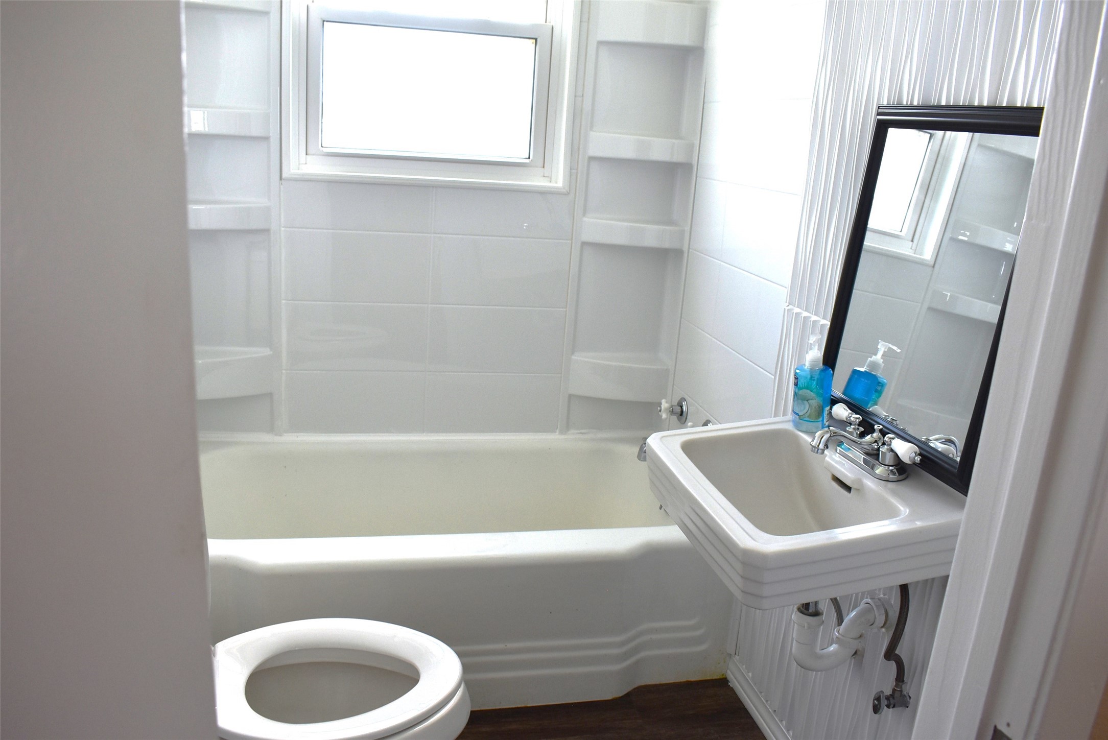 11 Chimaera Street Sargent, TX 77414 - Photo 16 of 40 a bathroom with a sink and a bathtub