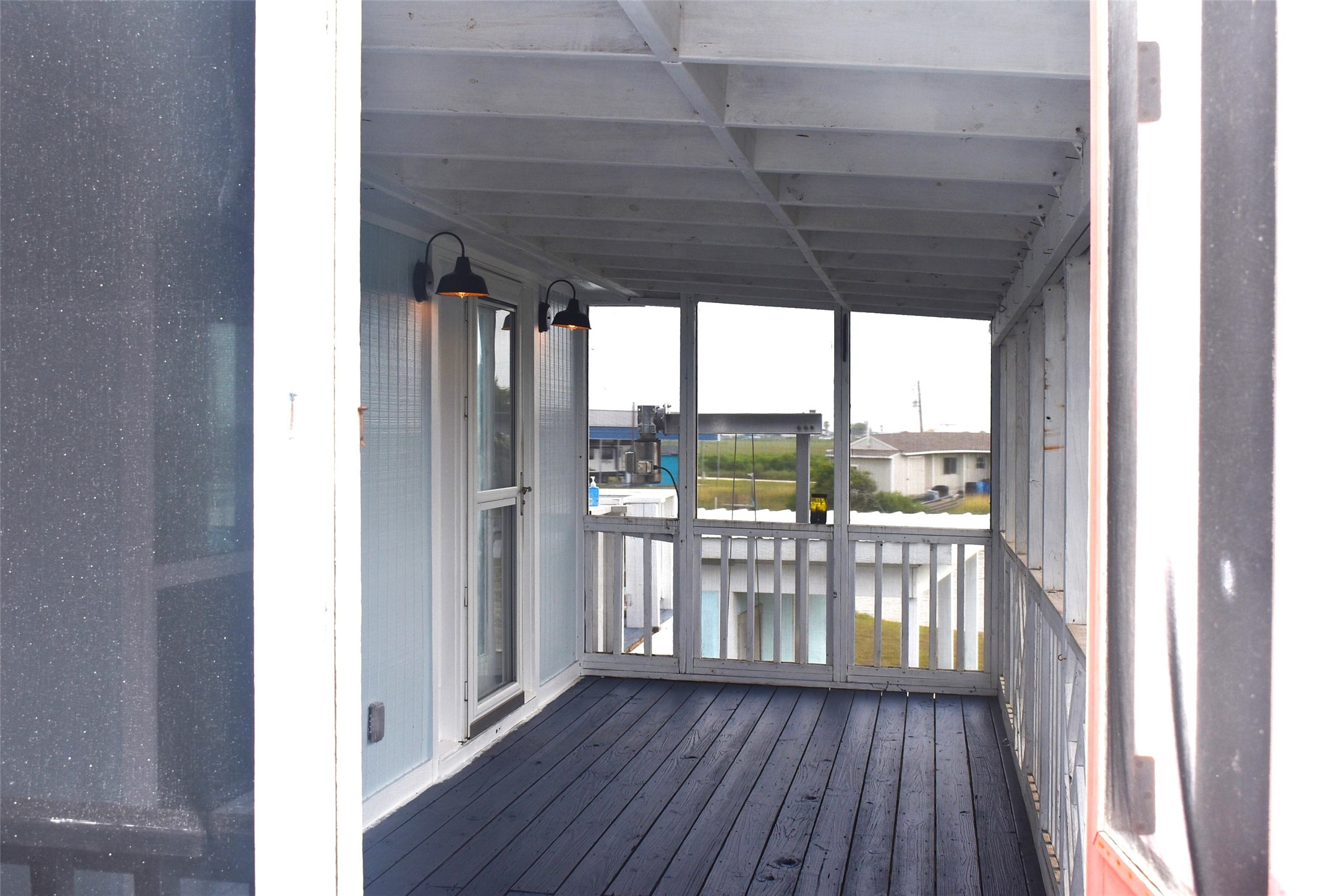 11 Chimaera Street Sargent, TX 77414 - Photo 40 of 40 a view of porch with wooden floor
