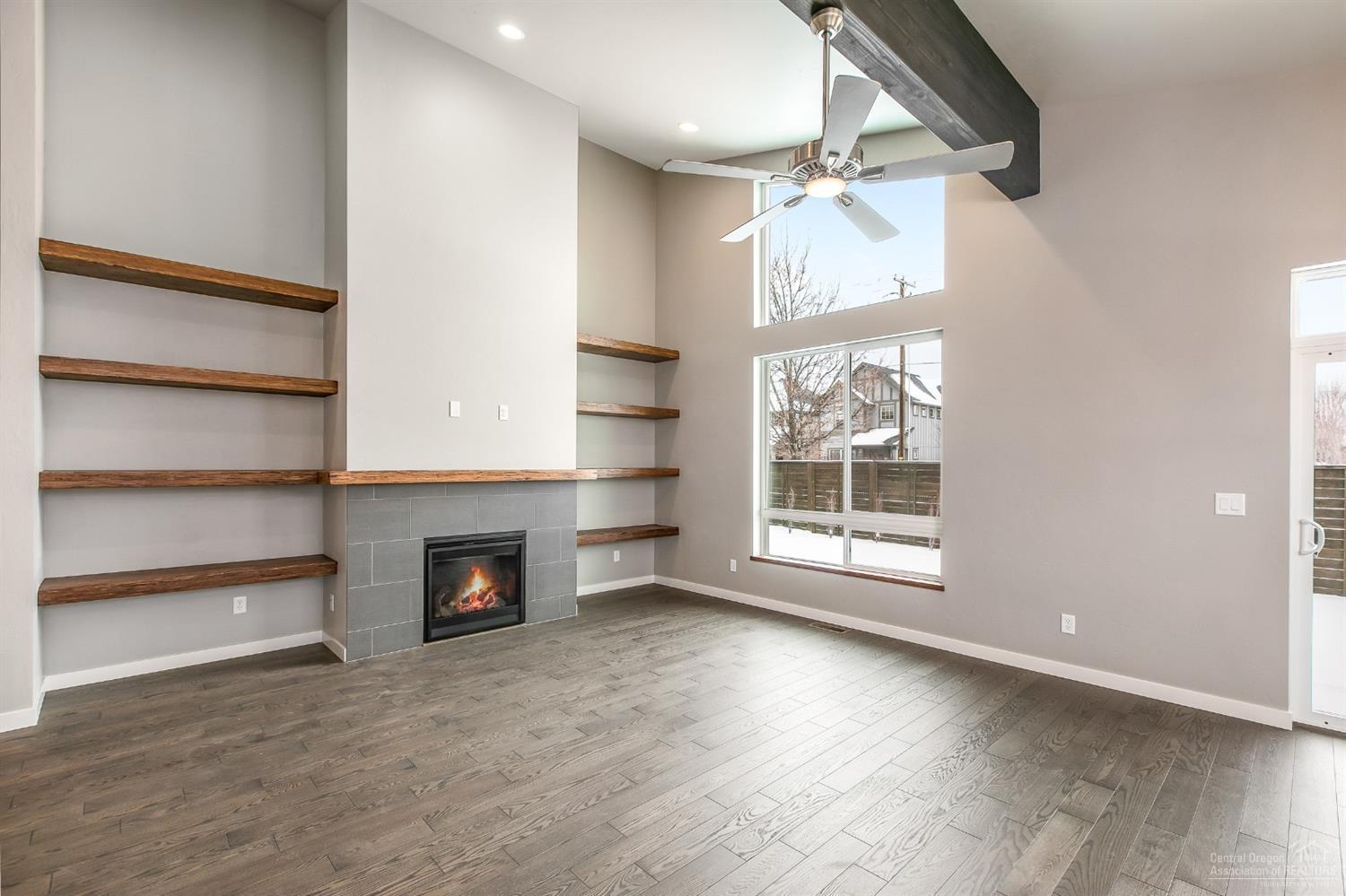63120 Iner Loop Bend, OR 97701 - Photo 6 of 25 Gas fireplace with built in free floating shelves. Pictures are of a similar home.