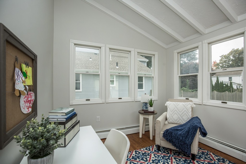 31 Ralph Road Marblehead, MA 01945 - Photo 13 of 24 a living room with furniture and a potted plant
