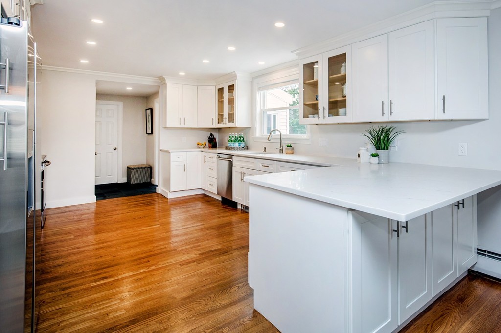 31 Ralph Road Marblehead, MA 01945 - Photo 6 of 24 a kitchen with stainless steel appliances granite countertop a sink counter space and cabinets