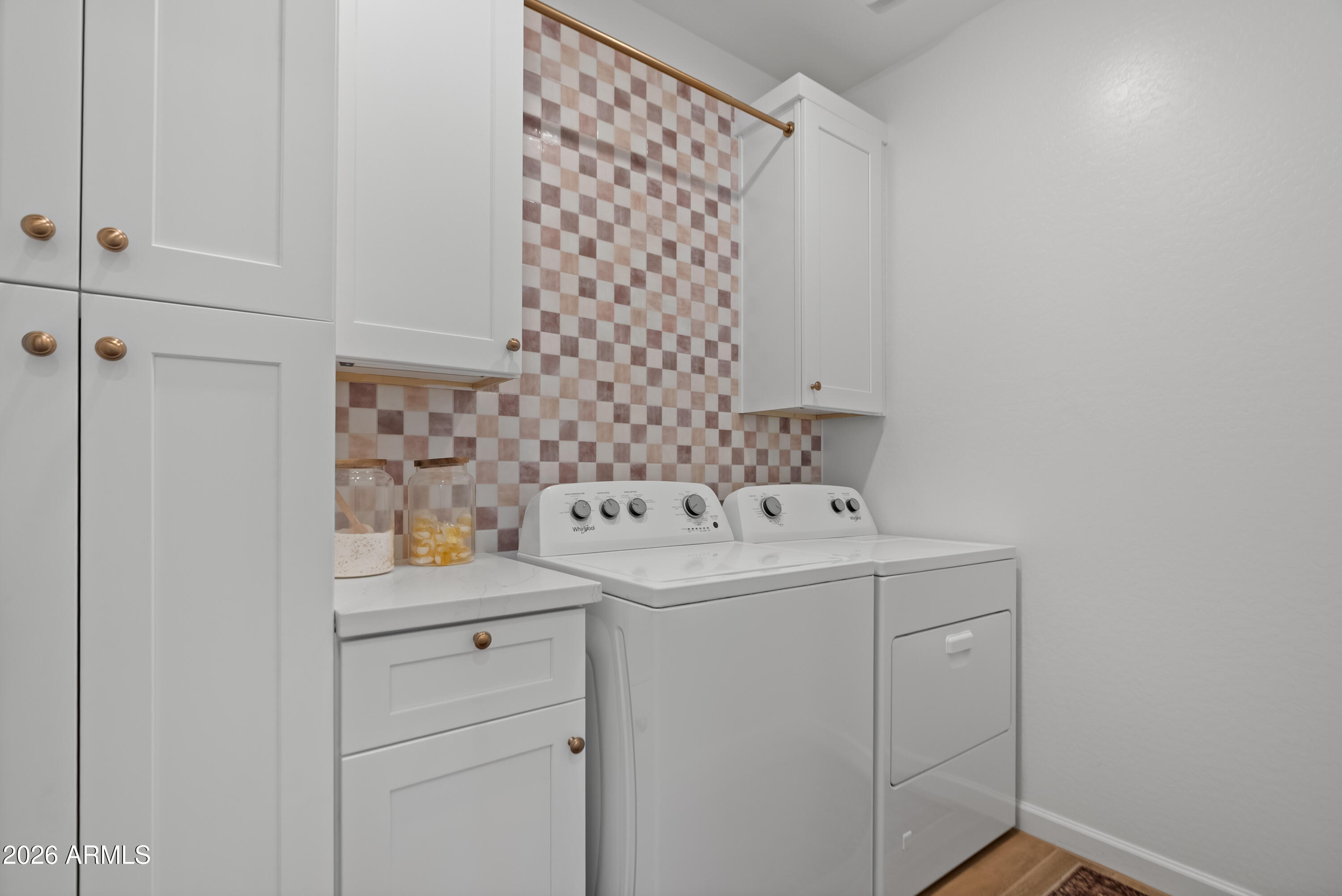 1989 West Hide Trail Phoenix, AZ 85085 - Photo 23 of 41 a utility room with dryer and washer