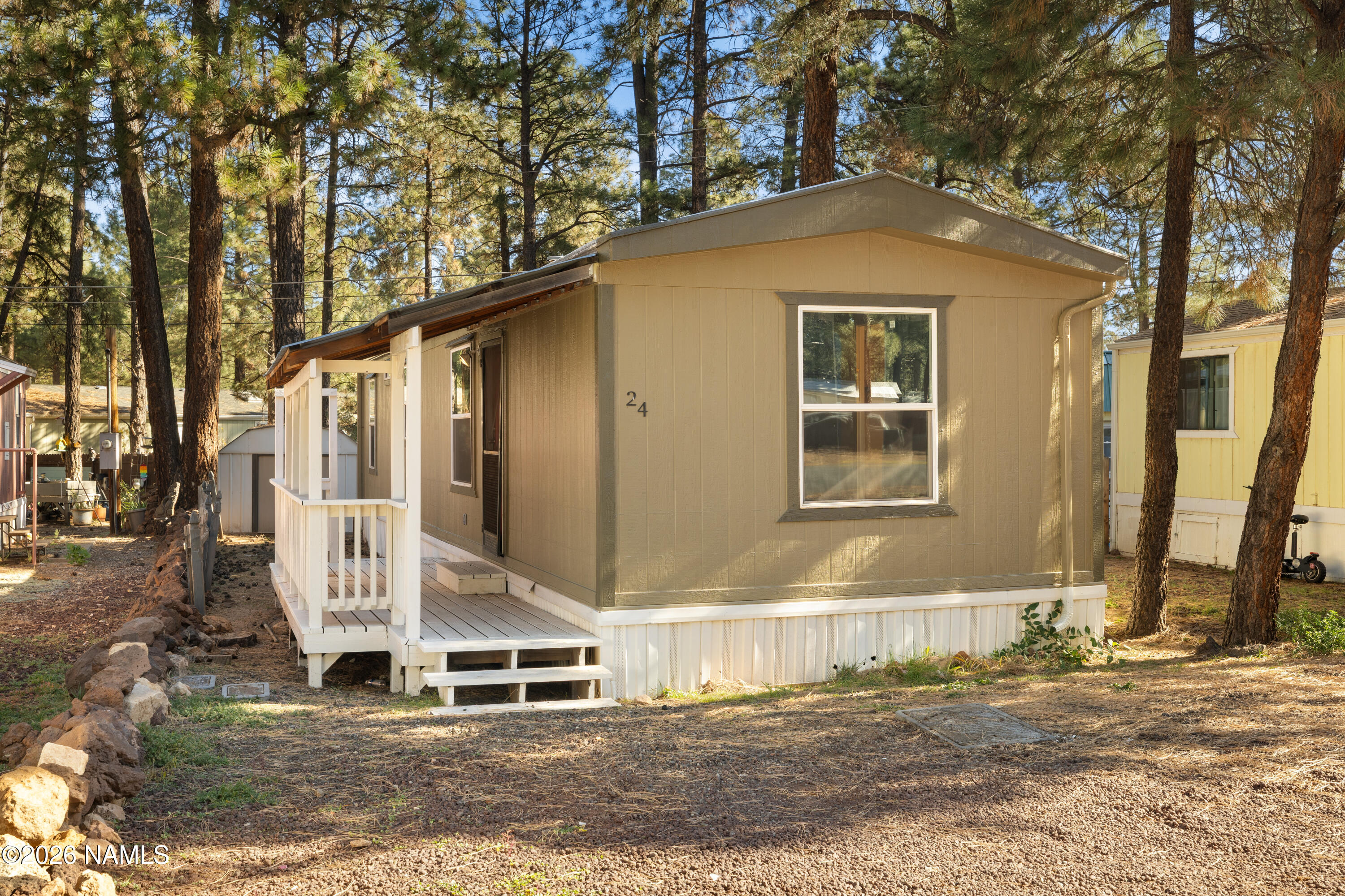 2500 West Rte 66, Unit 24 Flagstaff, AZ 86001 - Photo 2 of 13 a front view of a house