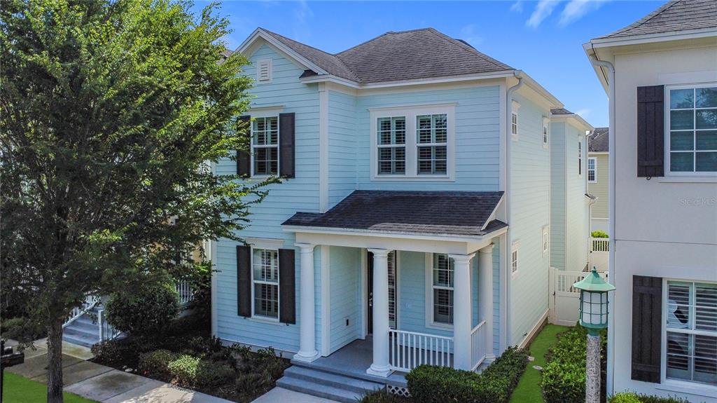 1513 Resolute Street Celebration, FL 34747 - Photo 3 of 43 a house view with a outdoor space