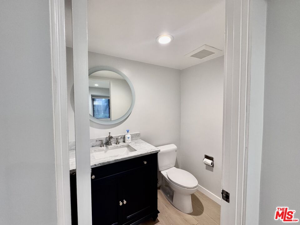4435 Alla Road, Unit 4 Marina del Rey, CA 90292 - Photo 7 of 23 a bathroom with a toilet sink and mirror