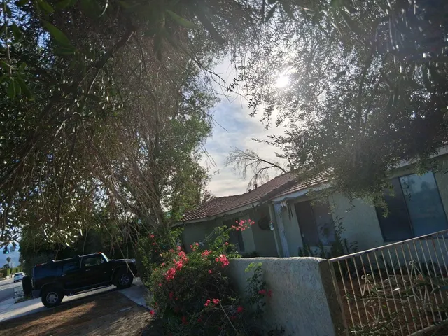 a view of street from balcony