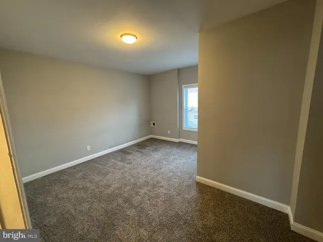 an empty room with a natural light
