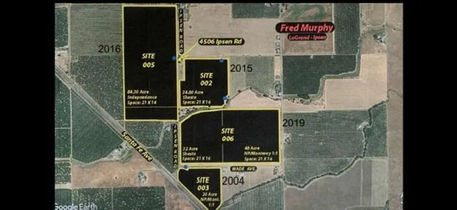 a view of a road with a yard