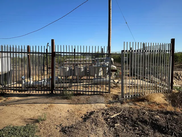 a view of a road with an ocean view