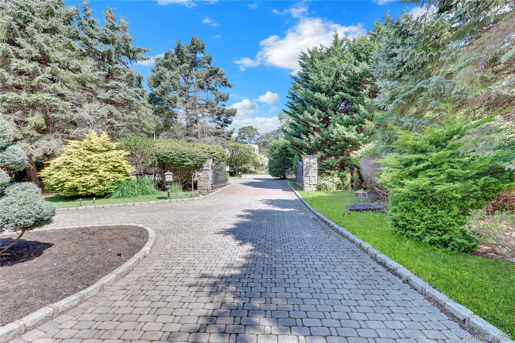 83 Cliff Road Port Jefferson, NY 11777 - Photo 4 of 50 View of road with curbs and view of wooded area