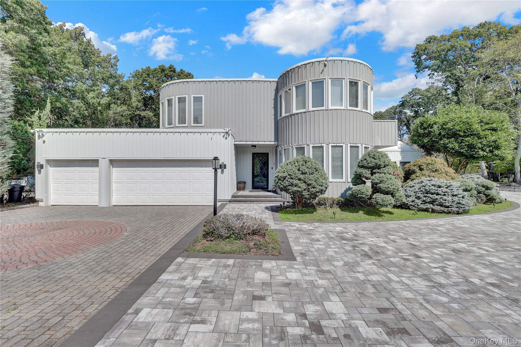 83 Cliff Road Port Jefferson, NY 11777 - Photo 46 of 50 Art deco house featuring decorative driveway