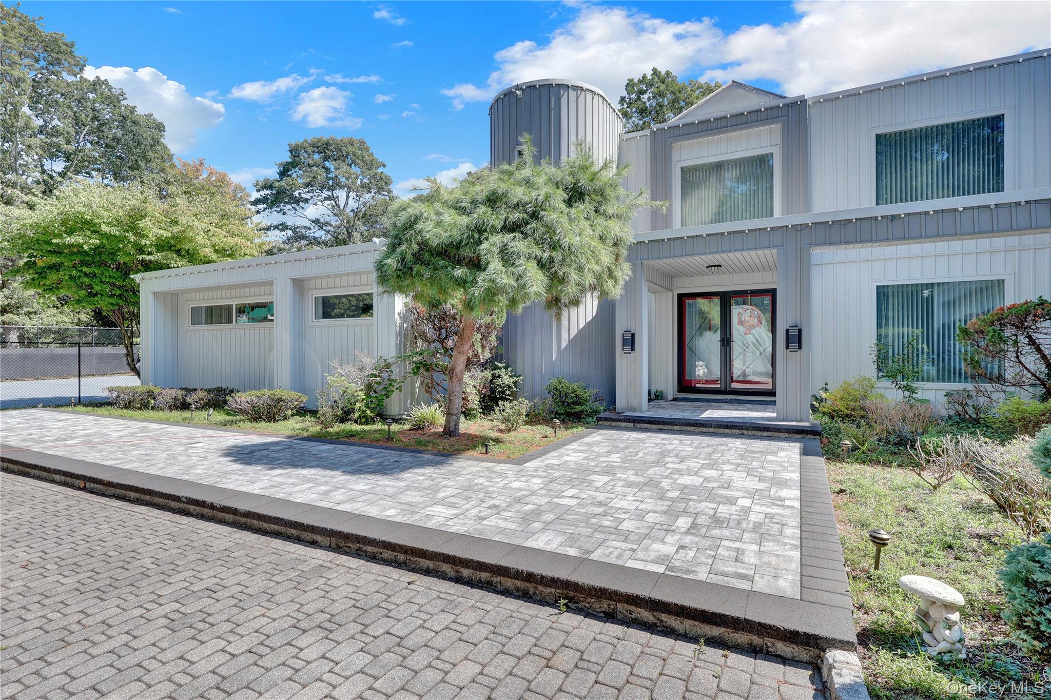 83 Cliff Road Port Jefferson, NY 11777 - Photo 48 of 50 View of front of home with french doors