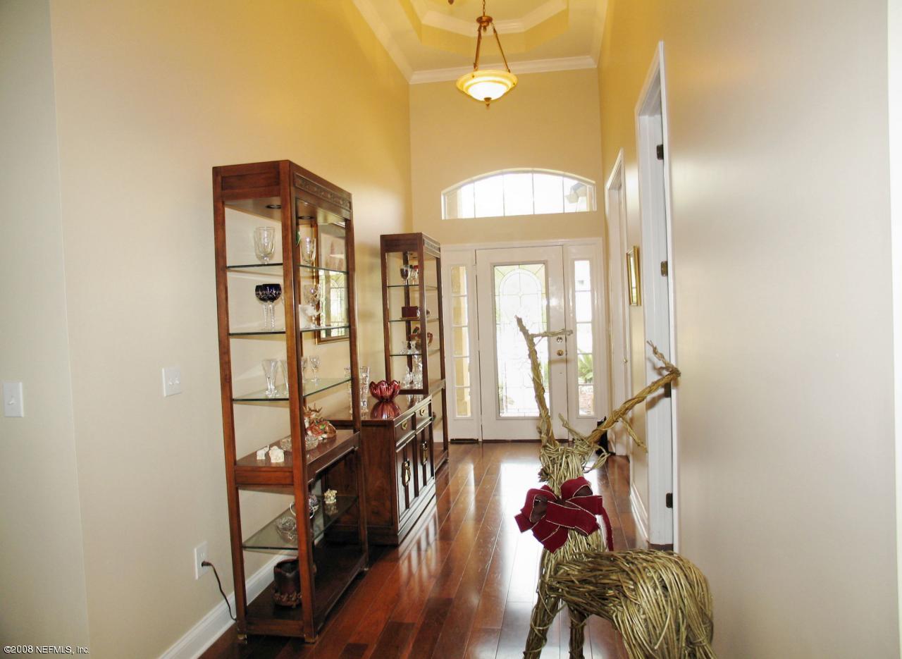 205 Edge Of Woods Road St. Augustine, FL 32092 - Photo 2 of 16 a view of a room with gym equipment