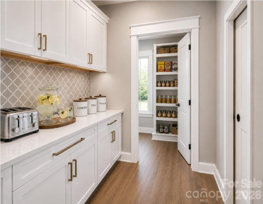 9745 Flowes Store Road Midland, NC 28107 - Photo 10 of 20 a kitchen with stainless steel appliances granite countertop a refrigerator and cabinets