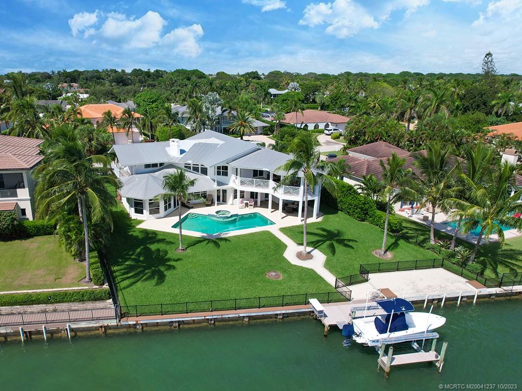 10 Island Road Stuart, FL 34996 - Photo 13 of 60 an aerial view of a house with a garden and houses