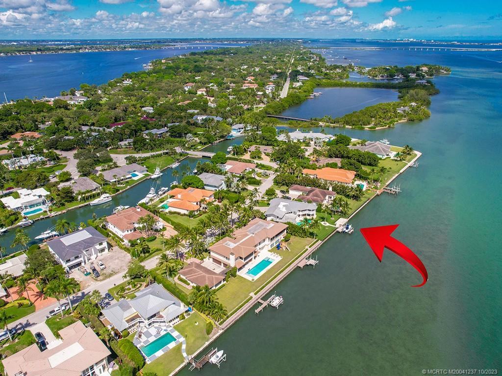 10 Island Road Stuart, FL 34996 - Photo 60 of 60 an aerial view of residential houses with outdoor space