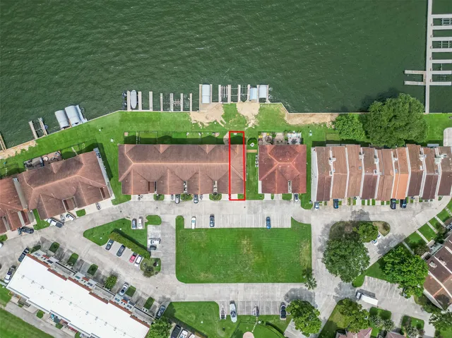 a aerial view of a house with garden space and outdoor seating