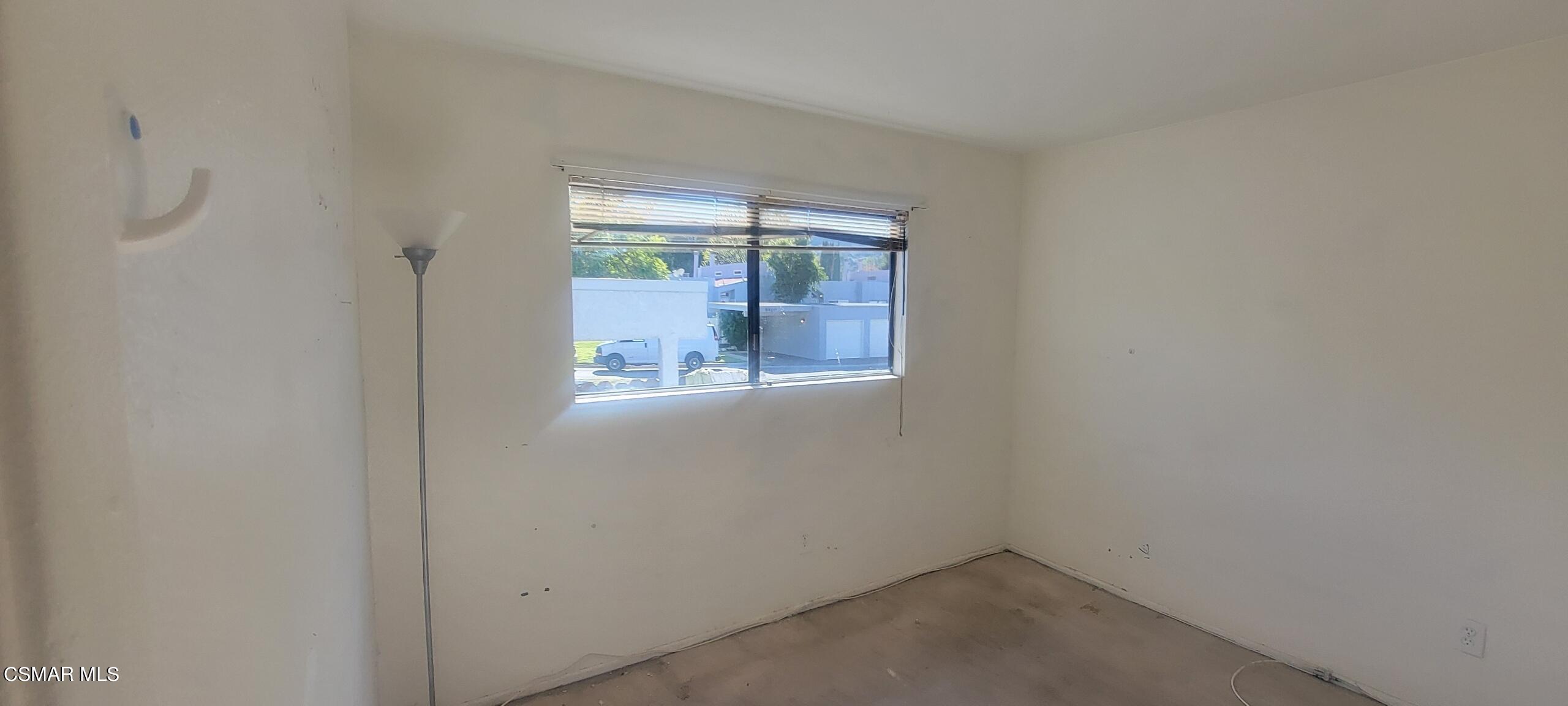 6416 Katherine Road, Unit D Simi Valley, CA 93063 - Photo 5 of 12 an empty room with a window