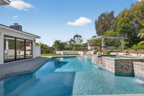 a house view with a garden space