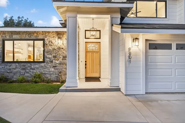 front view of a house with a yard