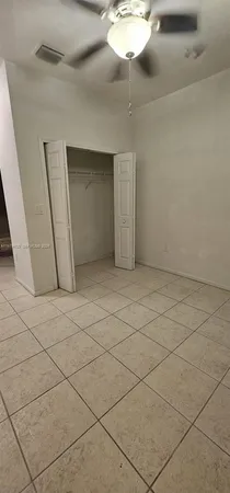 a bathroom with a shower and a bath tub