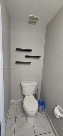 a bathroom with a toilet