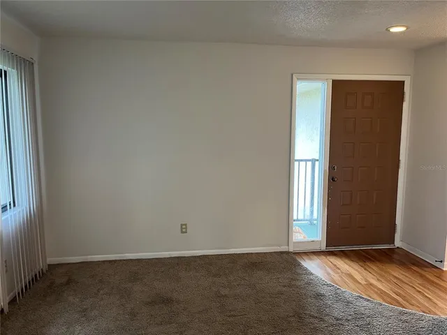 an empty room with window