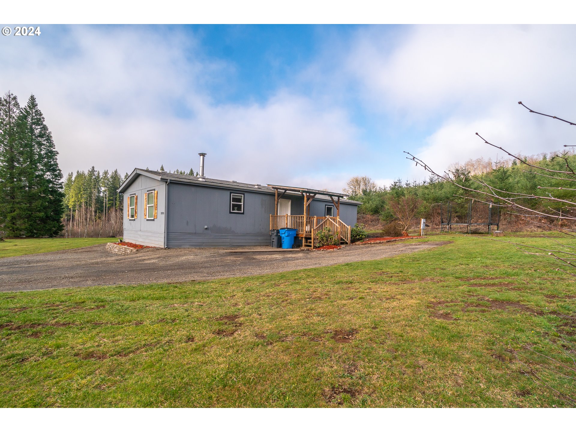 22233 Northeast Basket Flat Road Battle Ground, WA 98604 - Photo 13 of 46 a view of a house with a yard