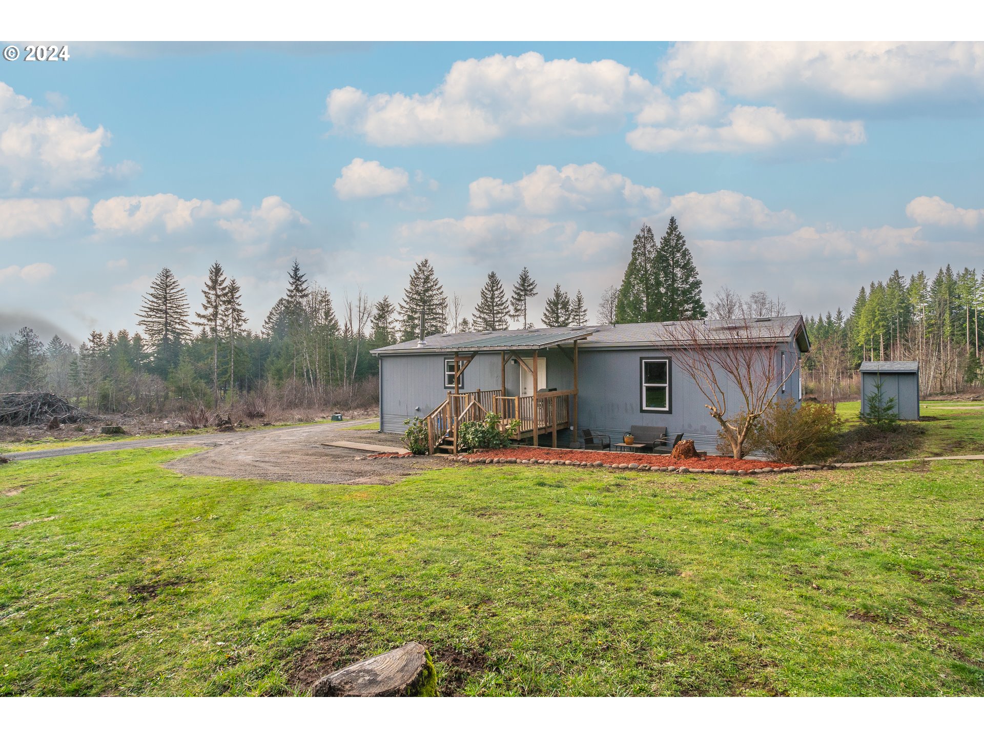 22233 Northeast Basket Flat Road Battle Ground, WA 98604 - Photo 14 of 46 a view of a house with a yard
