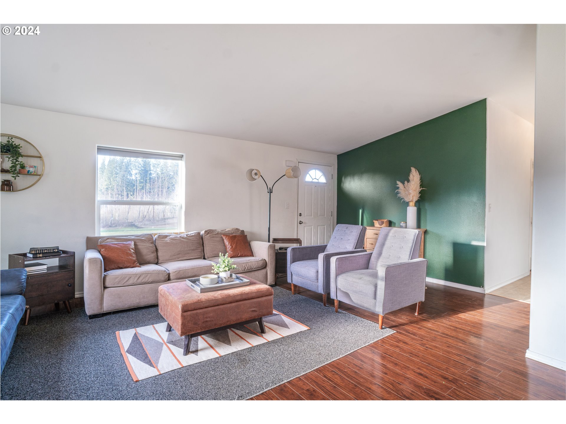 22233 Northeast Basket Flat Road Battle Ground, WA 98604 - Photo 15 of 46 a living room with furniture and a large window
