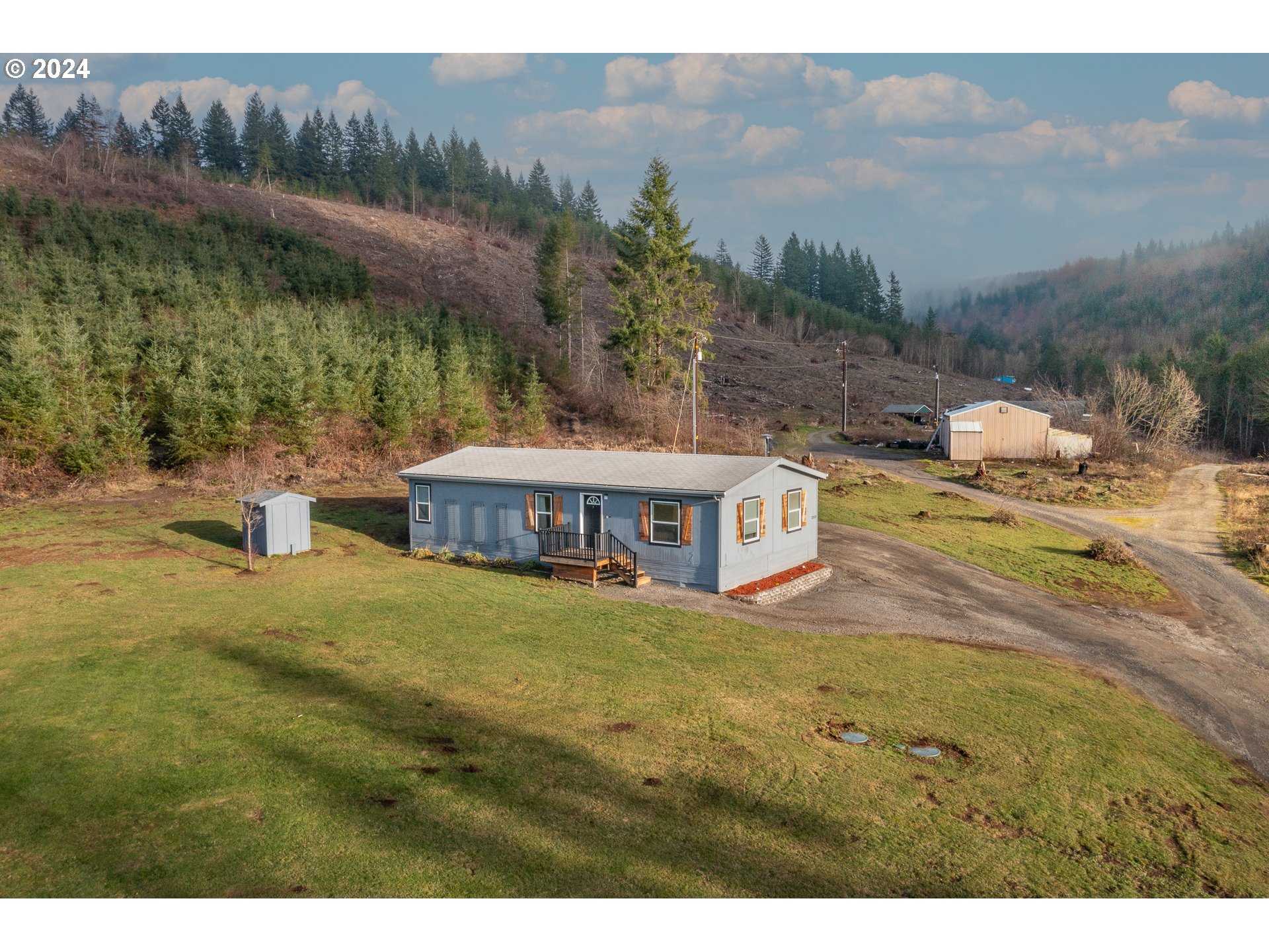 22233 Northeast Basket Flat Road Battle Ground, WA 98604 - Photo 2 of 46 a view of a house with a yard