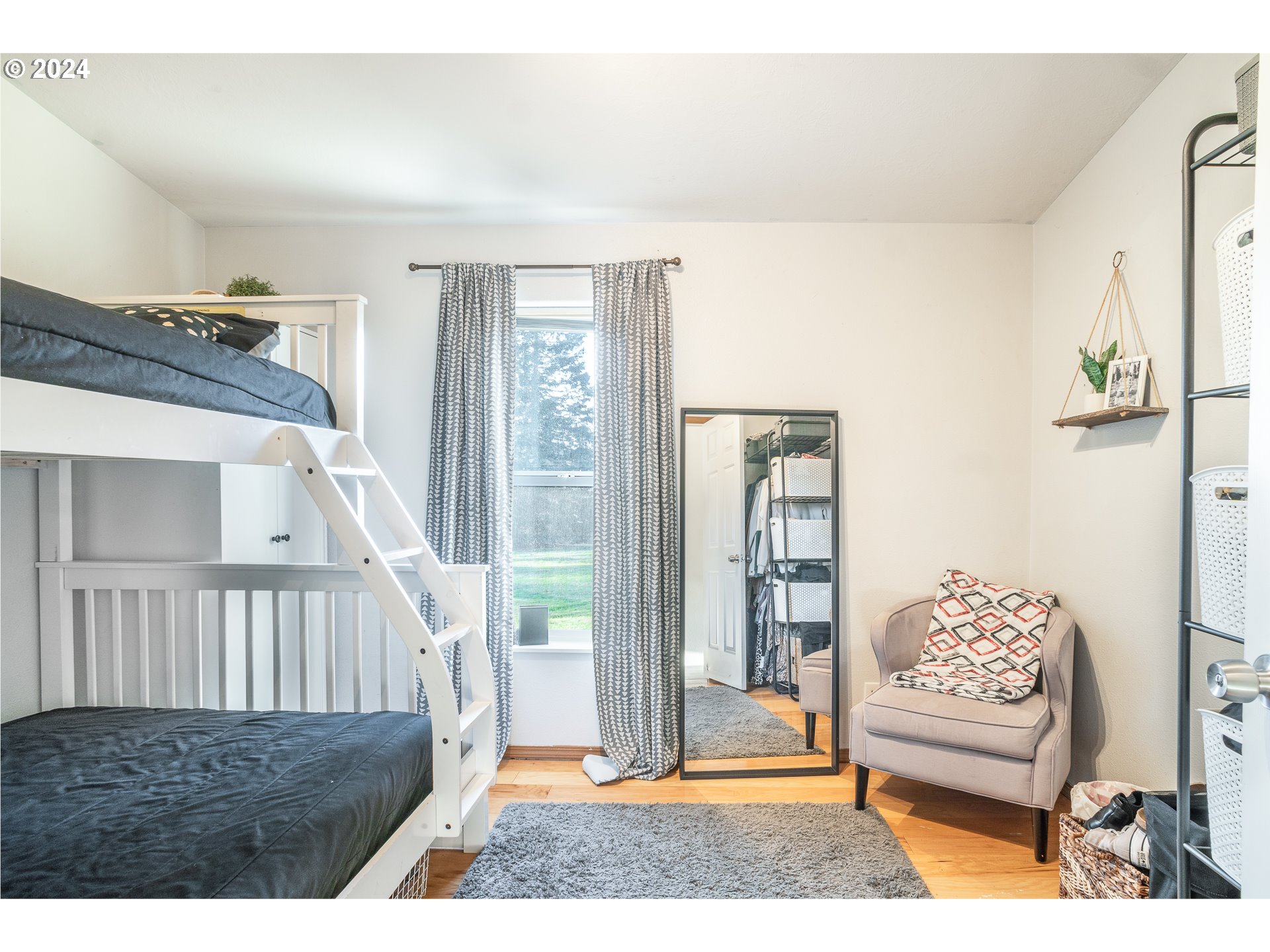 22233 Northeast Basket Flat Road Battle Ground, WA 98604 - Photo 23 of 46 a living room with furniture and a baby crib