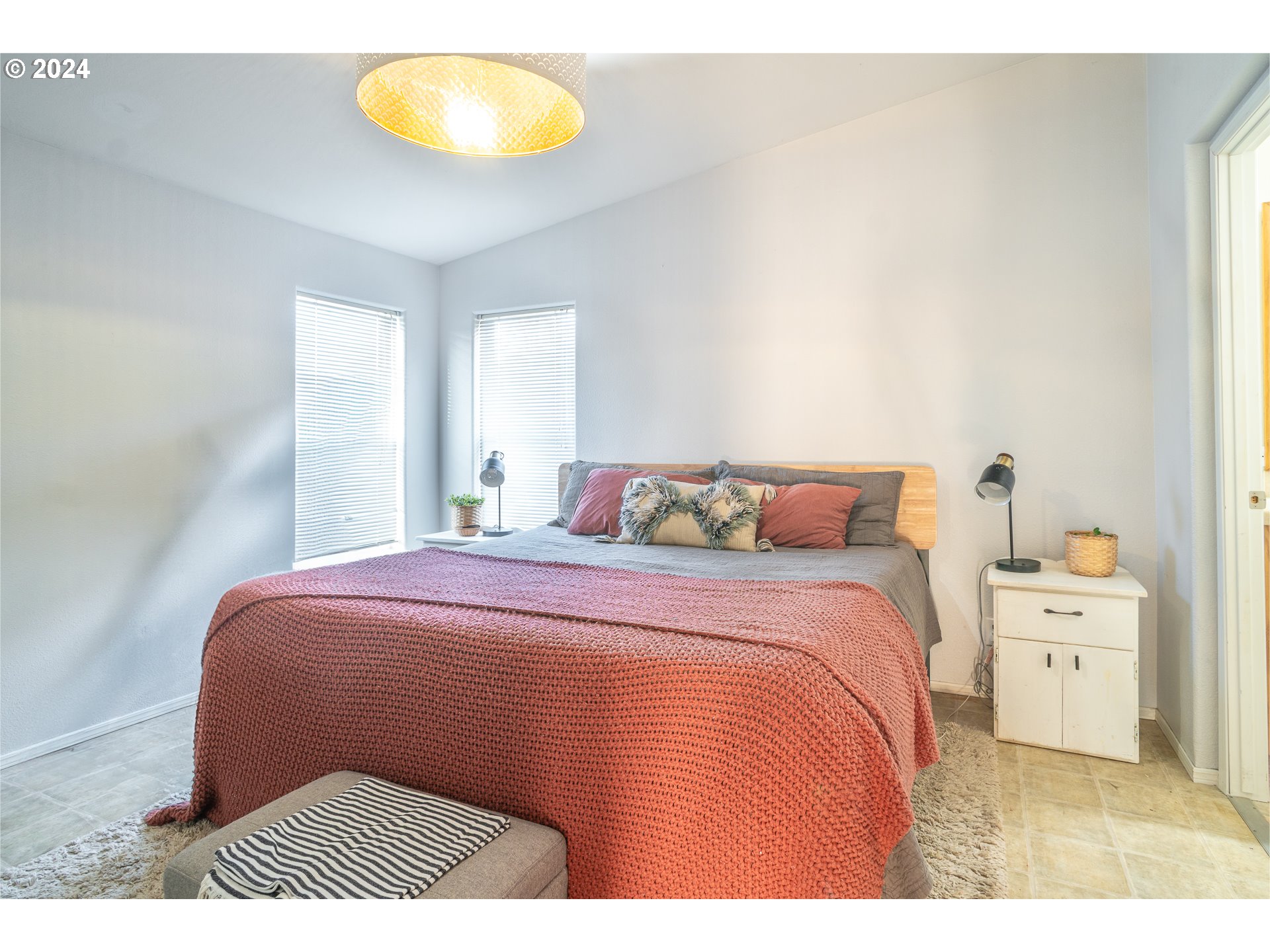 22233 Northeast Basket Flat Road Battle Ground, WA 98604 - Photo 28 of 46 a bedroom with a bed and a window