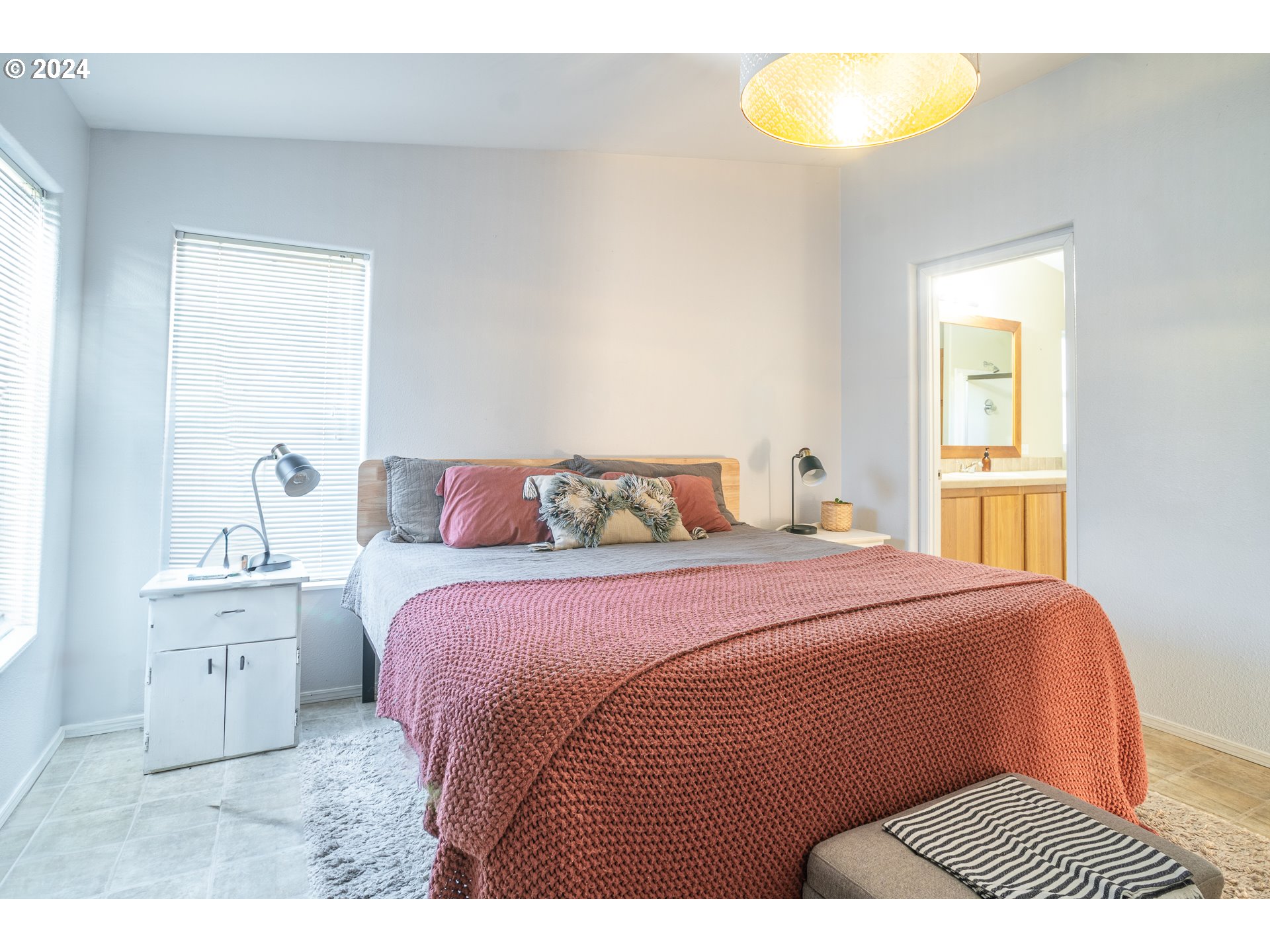 22233 Northeast Basket Flat Road Battle Ground, WA 98604 - Photo 29 of 46 a bedroom with a bed and a window