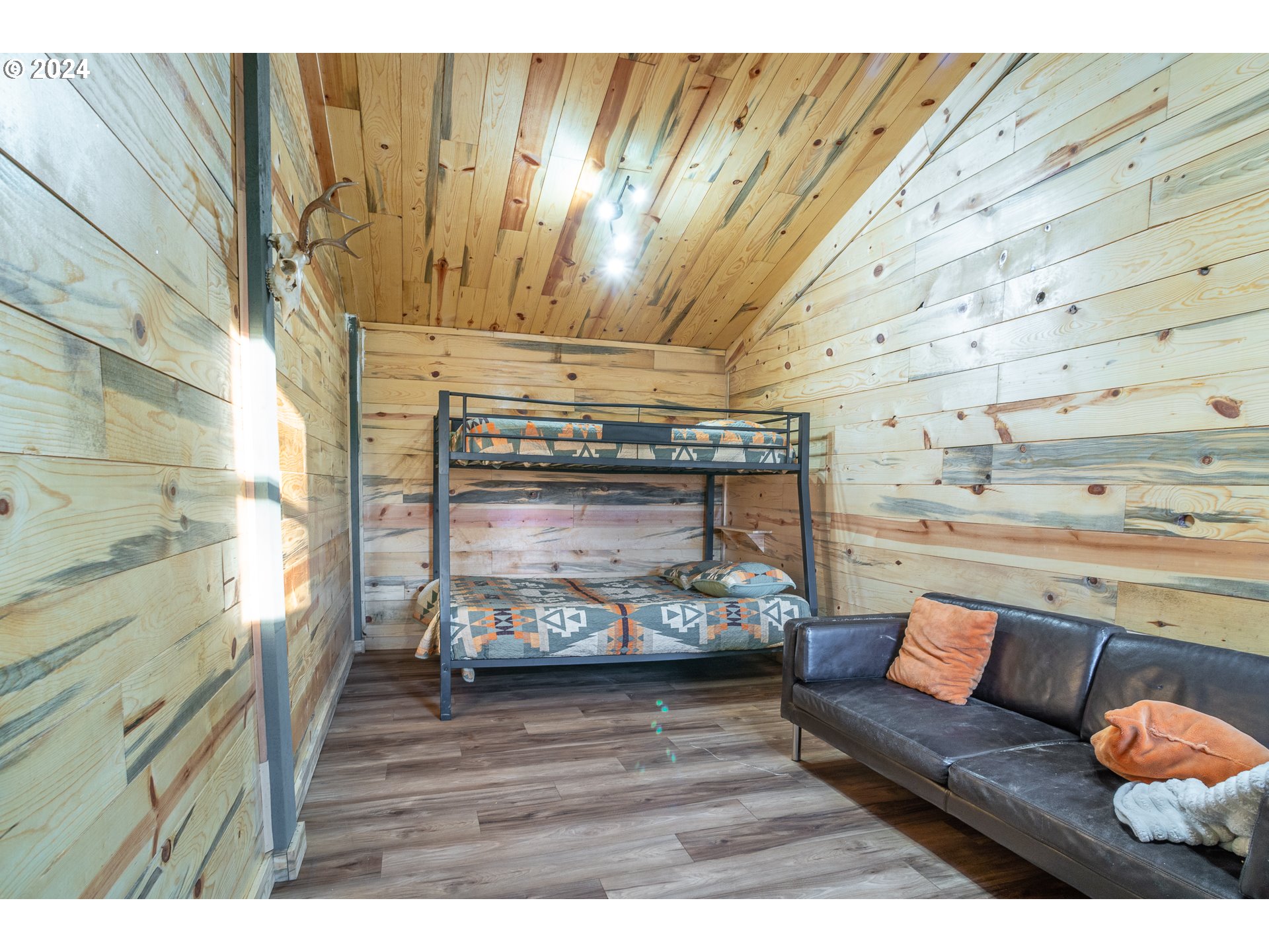 22233 Northeast Basket Flat Road Battle Ground, WA 98604 - Photo 42 of 46 a living room with furniture and a fireplace