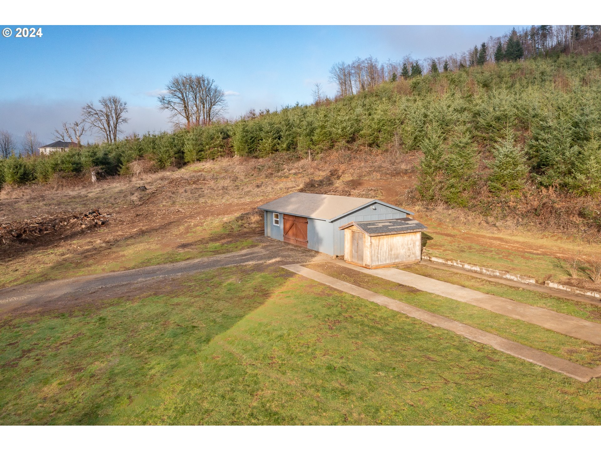 22233 Northeast Basket Flat Road Battle Ground, WA 98604 - Photo 7 of 46 a view of a yard with an outdoor space