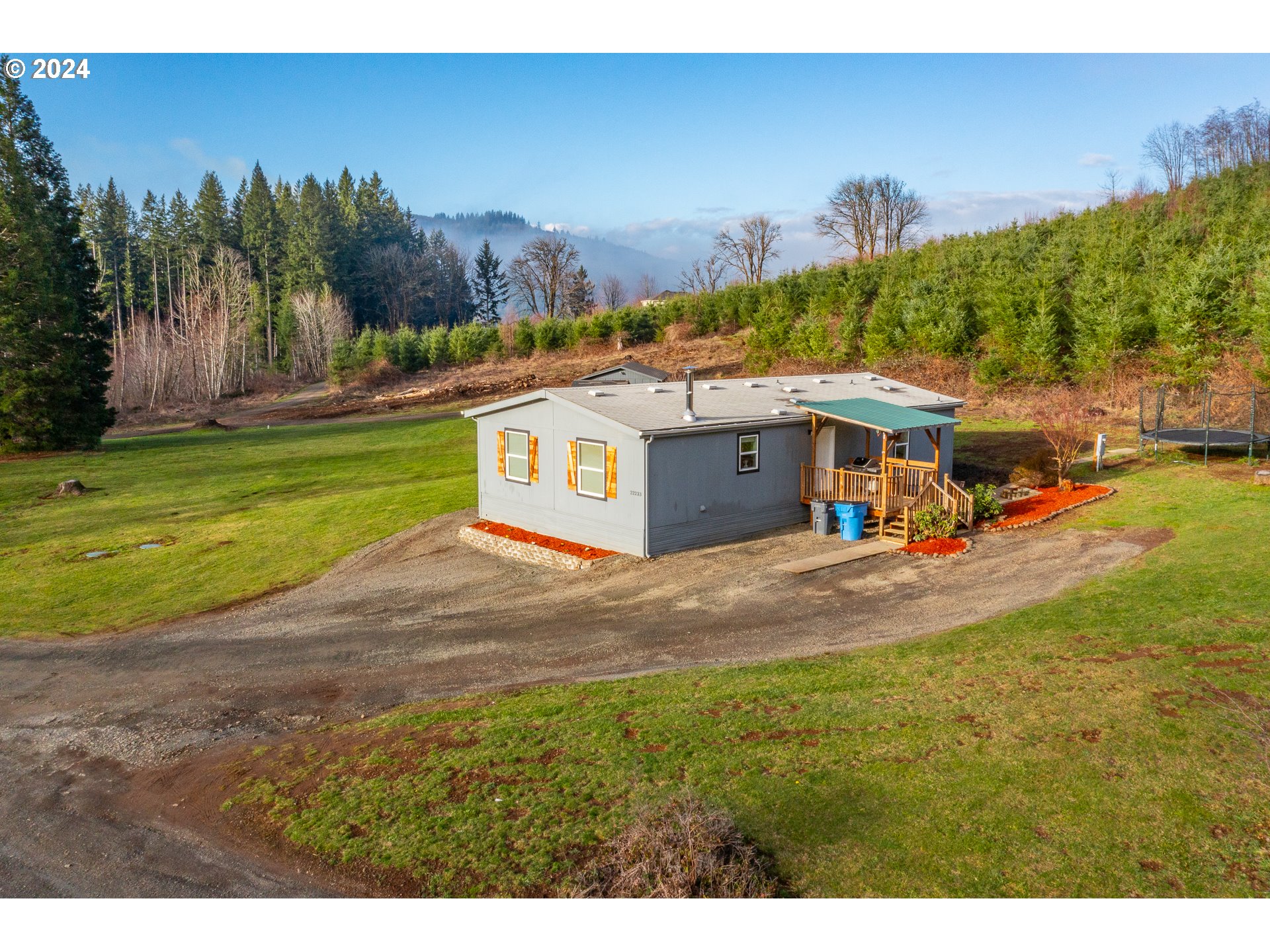 22233 Northeast Basket Flat Road Battle Ground, WA 98604 - Photo 9 of 46 a view of a house with a yard