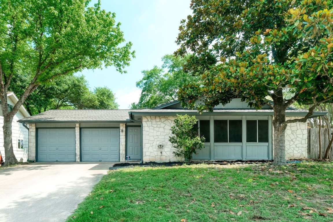 610 Mairo Street Austin, TX 78748 - Photo 1 of 1 front view of a house with a garden