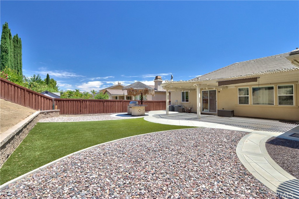 28483 Nautical Point Circle Menifee, CA 92585 - Photo 31 of 44 a view of a house with backyard and porch
