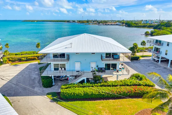 a view of a house with a swimming pool