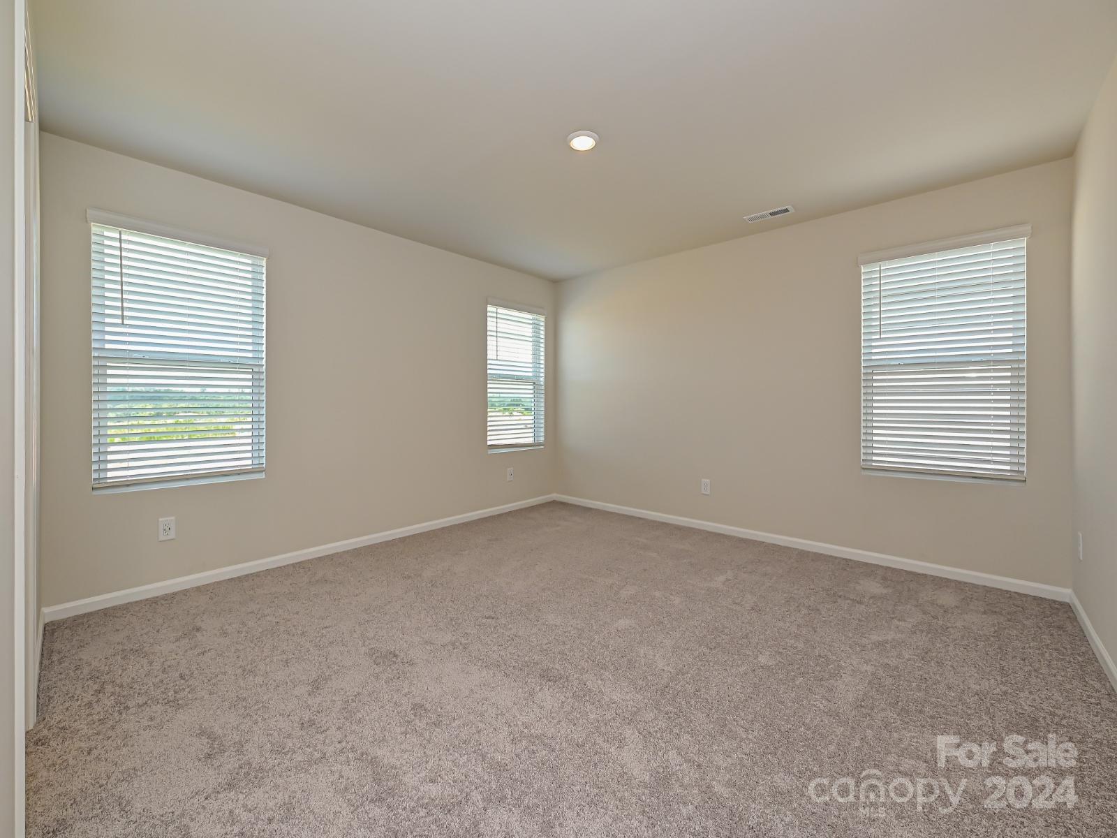 3840 Backwater Street Concord, NC 28027 - Photo 16 of 23 a view of an empty room with a window