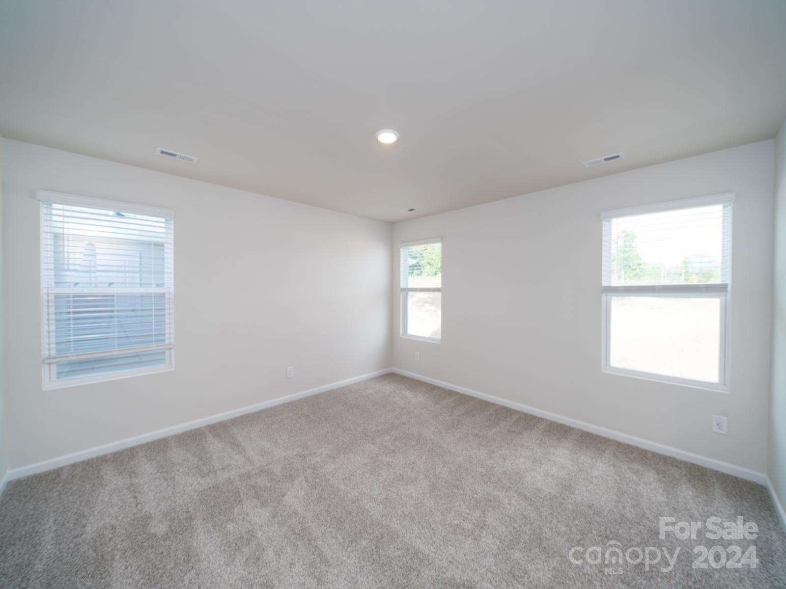 3840 Backwater Street Concord, NC 28027 - Photo 18 of 23 a view of an empty room with a window