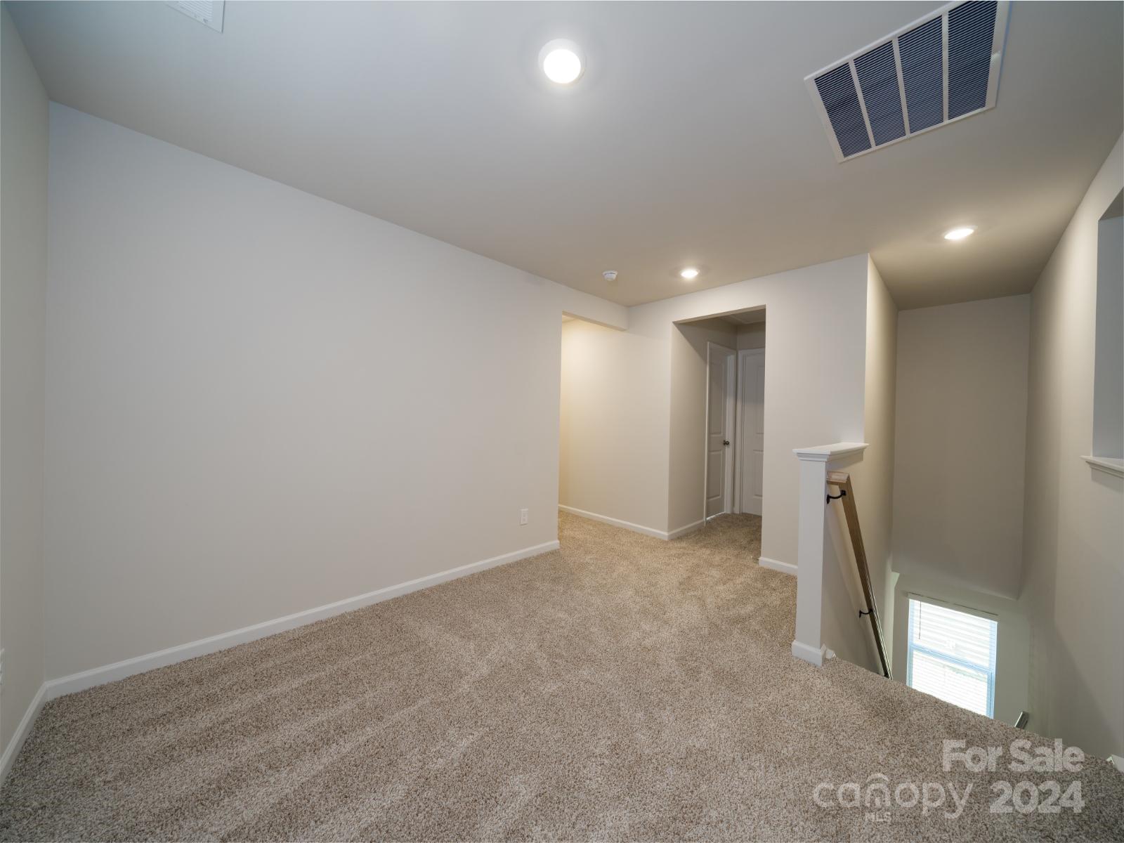 3840 Backwater Street Concord, NC 28027 - Photo 9 of 23 a view of hallway with a large window