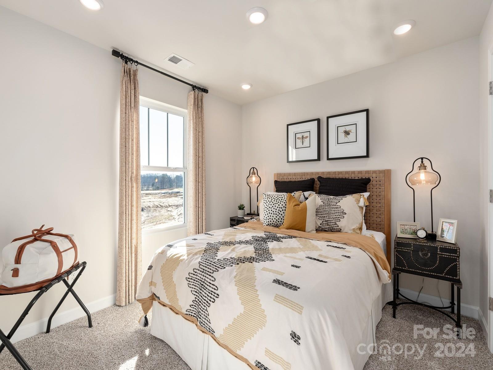 3840 Backwater Street Concord, NC 28027 - Photo 10 of 23 a bedroom with bed and a window