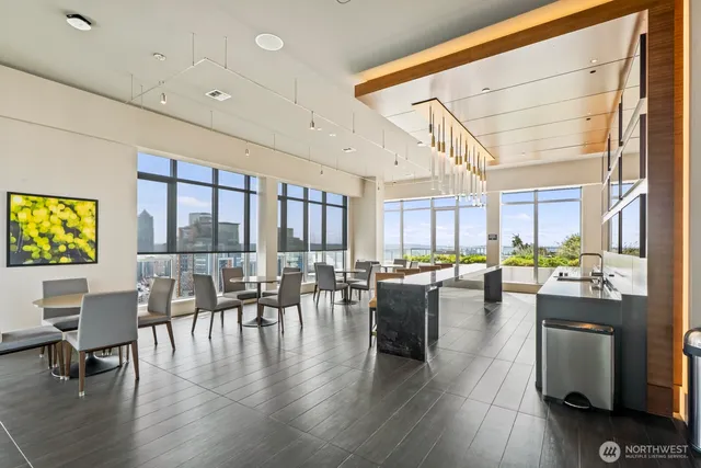 a view of a balcony with yard