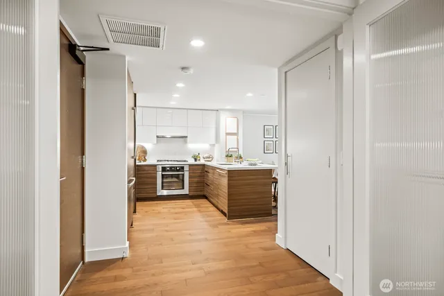 a workspace with furniture and window