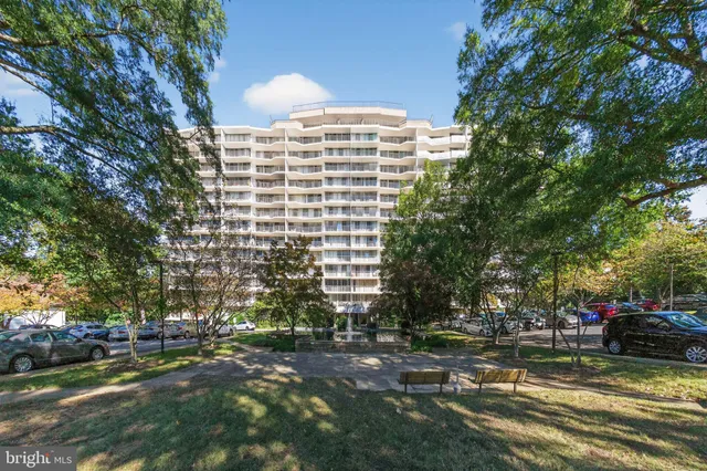 a view of a building with a yard