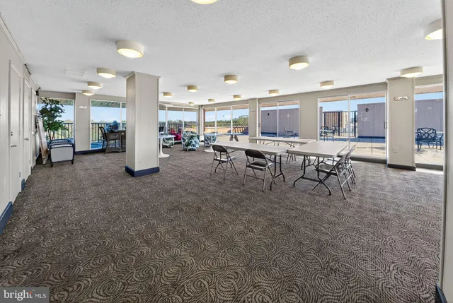 a view of a living room and livingroom with furniture