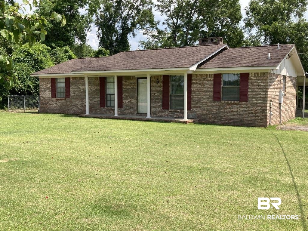 6151 Meadows Road Walnut Hill, FL 32568 - Photo 2 of 29 Ranch-style house with a front yard